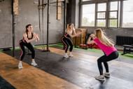 Squats are a great way to work the glute muscles. (Image via Pexels/Antoni Shkraba)
